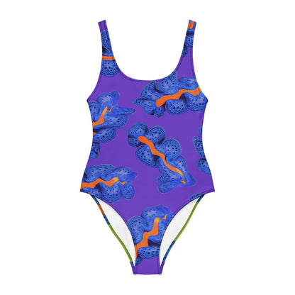 Purple swimsuit with blue and orange patterns on a white background