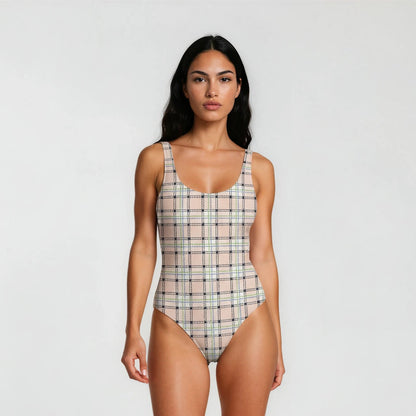 Woman wearing a plaid swimsuit on a white background